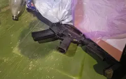 ضبط  بندقية M16  داخل حاوية نفايات في نحف وإعتقال مشتبه