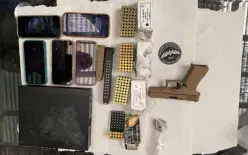 رهط: ضبط مسدس وبندقية M-16 ومئات حبات الذخيرة داخل ملحمة ومركبة واعتقال 4 مشتبهين