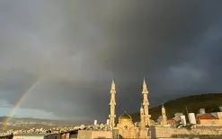 حالة الطقس: انخفاض طفيف في درجات الحرارة وفرصة لأمطار خفيفة صباحاً